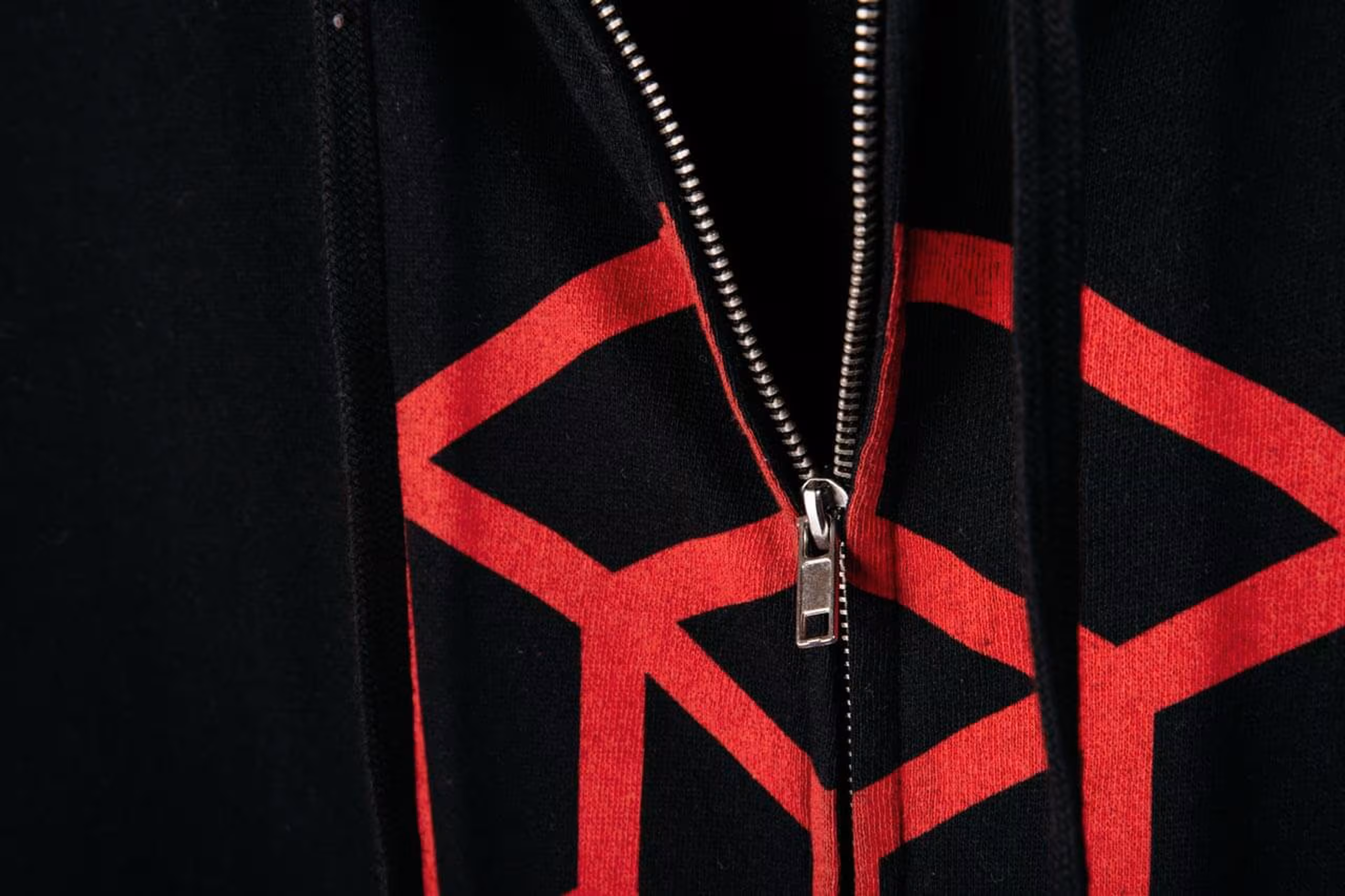 Black sweatshirt with red over the zipper printing
