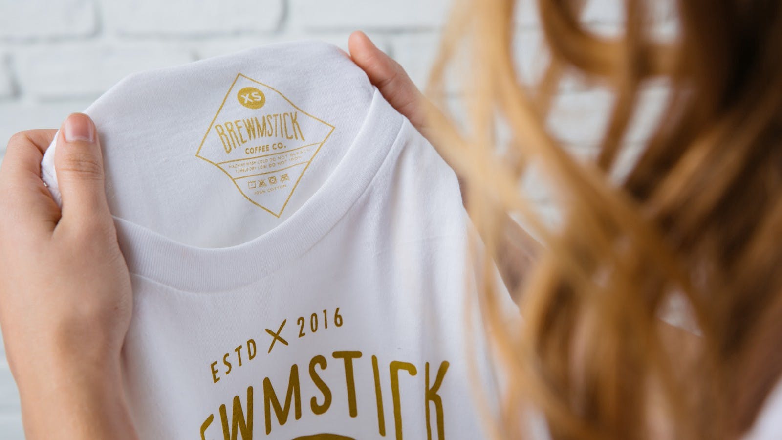 white t-shirt with gold color tag printing white t-shirt with gold color tag printing