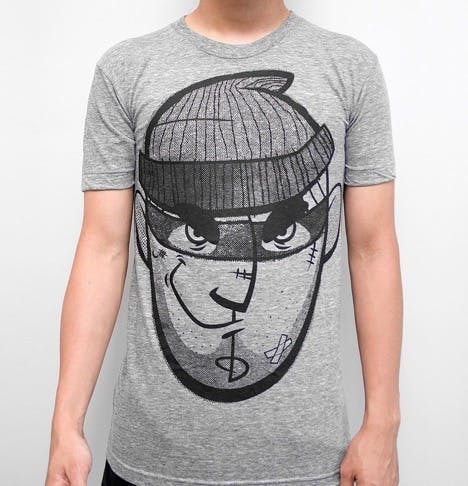 gray t-shirt with a face printed on it gray t-shirt with a face printed on it