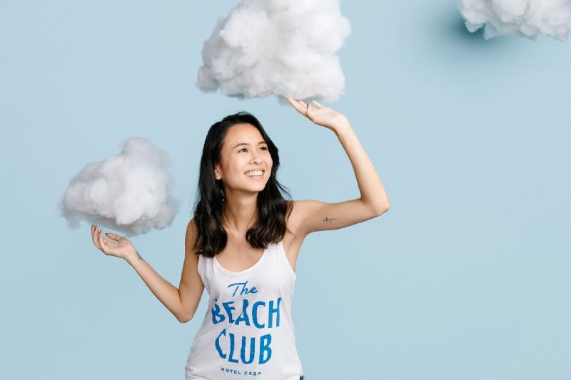 women holding up clouds women holding up clouds