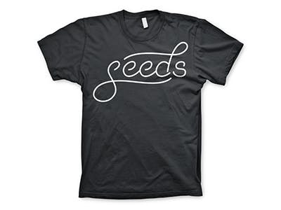 black shirt with the words seeds printed on it black shirt with the words seeds printed on it