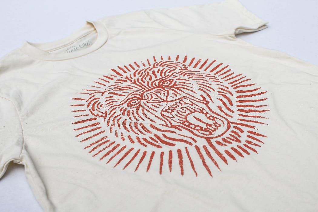 gray t-shirt with a red lion gray t-shirt with a red lion