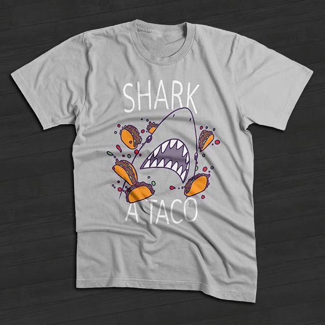 gray t-shirt with a design that has shark a taco printed on it gray t-shirt with a design that has shark a taco printed on it