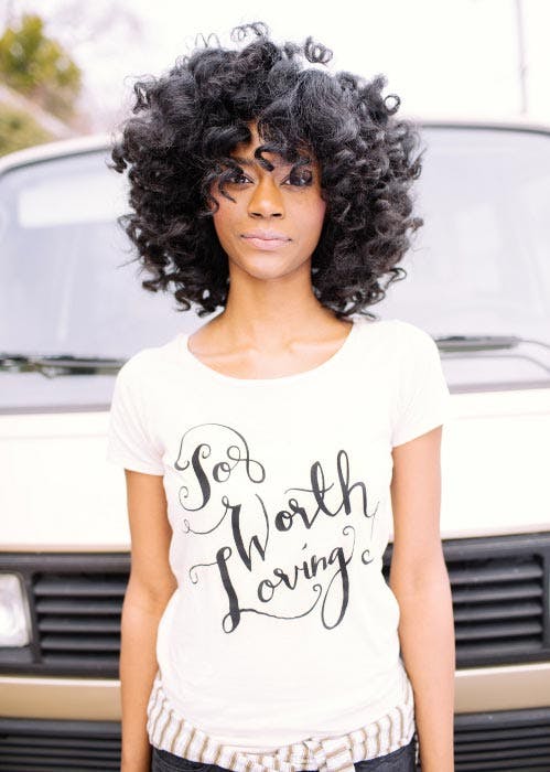 white shirt with worth leaving printed on it white shirt with worth leaving printed on it