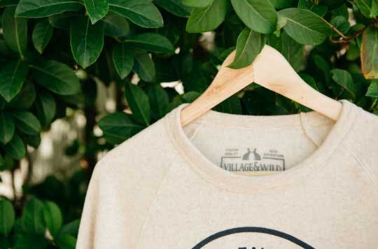 tan shirt hanging on a tree tan shirt hanging on a tree
