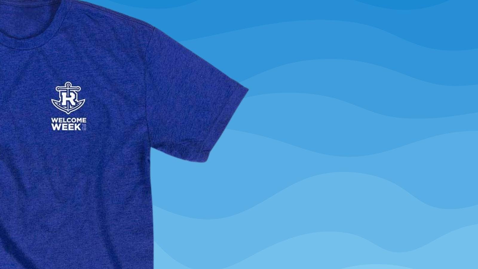 Royal blue shirt with a white anchor and R logo on a wave background Royal blue shirt with a white anchor and R logo on a wave background